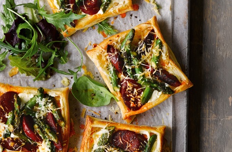 These savoury tarts are so simple to make and packed full of spring flavour. Golden, light-as-air pastry topped with smoky chorizo, nutty asparagus and creamy Manchego – baking in the oven makes these beautiful bites gorgeously gooey
