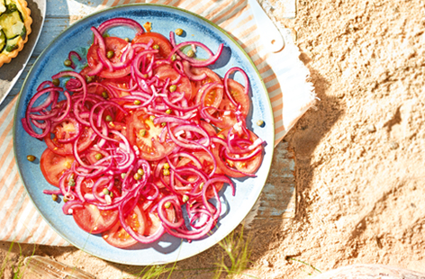 Juicy vine tomatoes and red onions give a delicious brightness to your plate. 