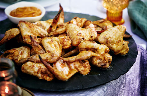 Serve up a plateful of finger-licking chicken wings marinated in a deliciously zesty and sweet sauce and get everyone to tuck in. 