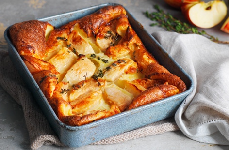 Revamp classic toad in the hole by adding crisp, seasonal apples for a fruity roast dinner side