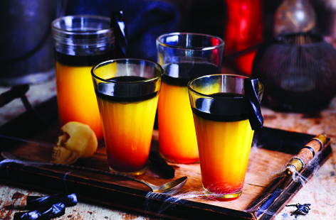 This eerie black cocktail is a scary twist on a classic screwdriver - a wonderfully spooky Halloween party idea and perfect for both delighting and terrifying your friends