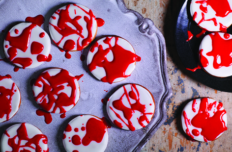 These scary gingerbread biscuits are a great addition to any Halloween party spread. Sweet gingerbread biscuits are transformed into terrifying treats with a splattering of red icing