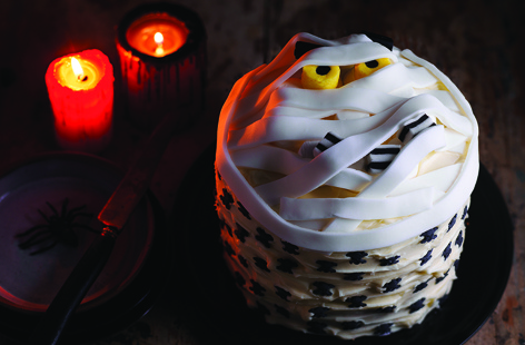 This terrifying marshmallow mummy cake is a real Halloween showstopper that's sure to impress your guests. Vanilla-flavoured sponge sandwiched with a gory cherry jam and coconut filling – with a few decorations this Halloween bake really comes to life