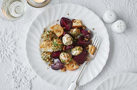 This vibrant, textured salad is the perfect starter to kick off your Christmas dinner. Sweet, earthy beetroot in a fragrant herb crust paired with the crunchy walnuts and creamy goat's cheese – a classic Christmas starter that's sure to get good results