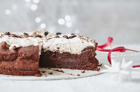 Sumptuously rich and creamy, this decadent flourless chocolate and coffee cake is perfect for serving to gluten-free guests
