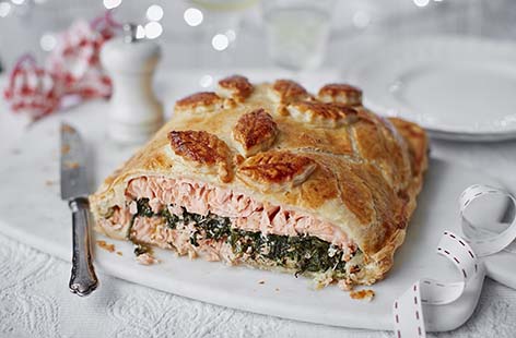 Pull out all the stops this festive season with a stunning salmon centrepiece. Light baked salmon topped with creamy spinach and toasted almonds, all wrapped up in buttery pastry – this alternative Christmas dinner is sure to be the star of the show