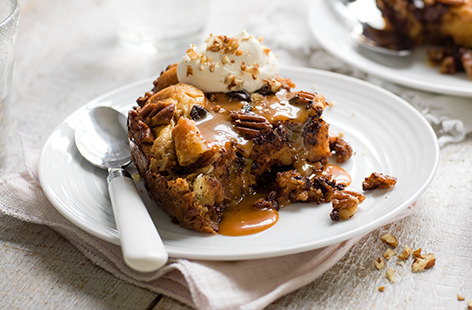 Sink into this sticky, sweet brioche bread pudding, packed with dark chocolate and pecans, loaded with salted caramel sauce, and made in a slow-cooker! For an extra kick, why not try adding dark rum, it works beautifully with the bitter chocolate