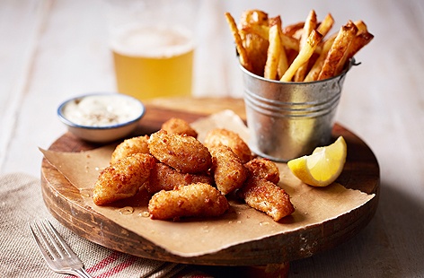 This pub classic makes a great sharing dish. Simply bake breaded scampi and impress with these easy-to-make chips