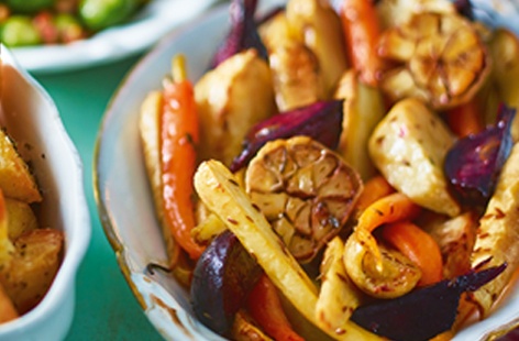 This deliciously festive and healthy vegetarian side dish takes hearty root vegetables, from nutty celeriac to earthy beetroot, and drizzles them in maple syrup and mustard to bring out their natural sweetness. 
