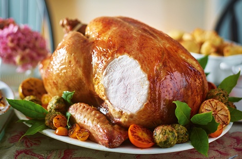 This golden turkey centrepiece will not fail to impress on Christmas day. Not only is the meat succulent and tender, but the pistachio stuffing lends an earthy, nutty flavour and the citrus butter brings a velvety zing
