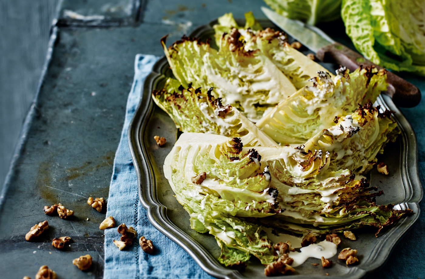 Roasted Savoy cabbage wedges with blue cheese dressing and walnuts recipe