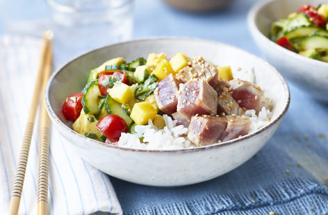 Traditionally, this Hawaiian speciality, pronounced poh-kay, was a local, street-side snack, but here we enjoy it as a simple, flavour-packed supper. Served with chopped mango and a sweet and sour lime dressing, this recipe will take you to the tropics