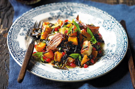 This bejewelled, autumnal wild rice salad with pomegranate seeds, warm pumpkin and grilled halloumi is a feast for the eyes as well as the stomach. A honey, fresh mint, olive oil and red wine vinegar dressing is drizzled over to finish.