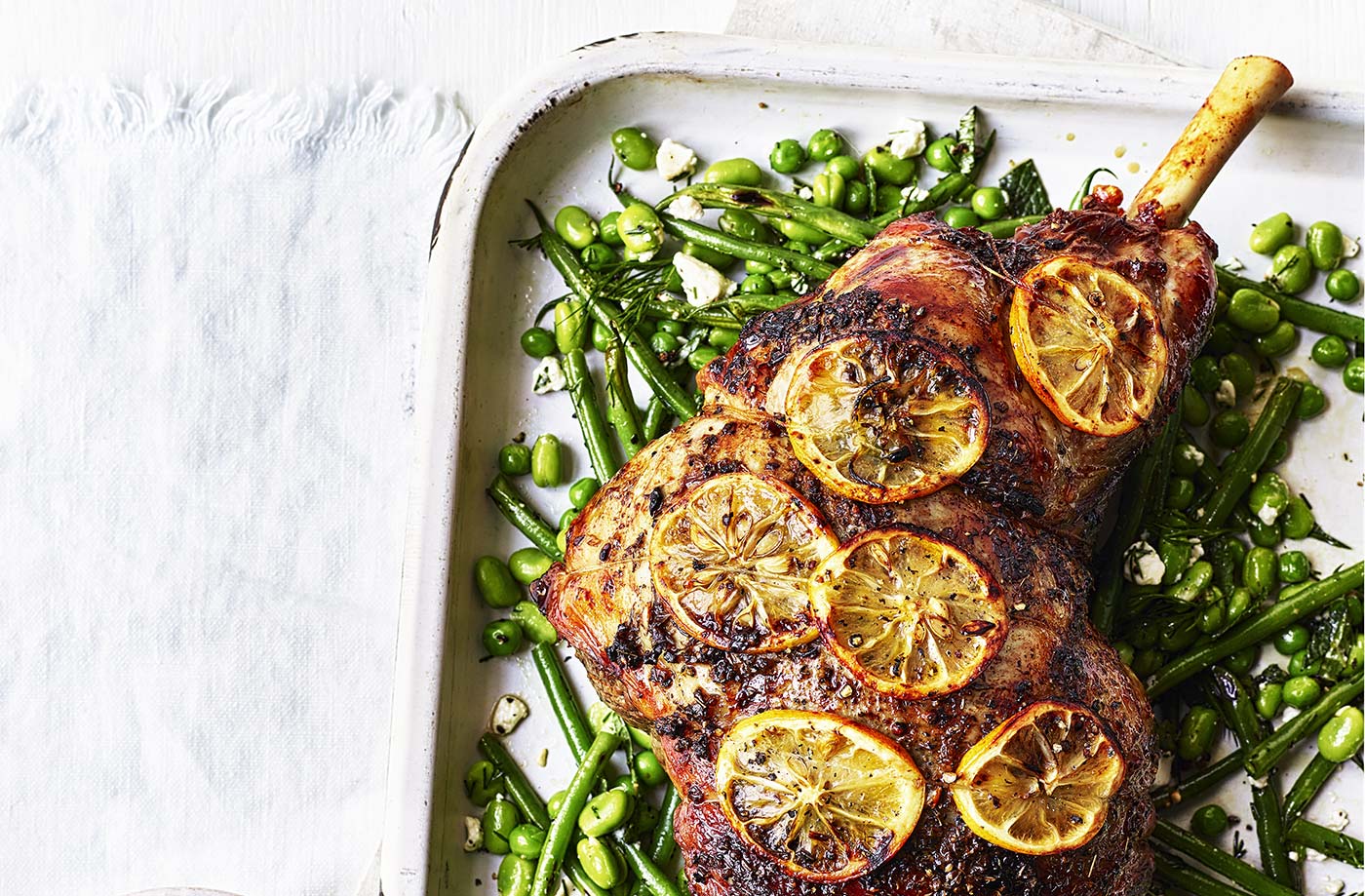 Roasted leg of lamb stuffed with feta, olives and pistachios recipe