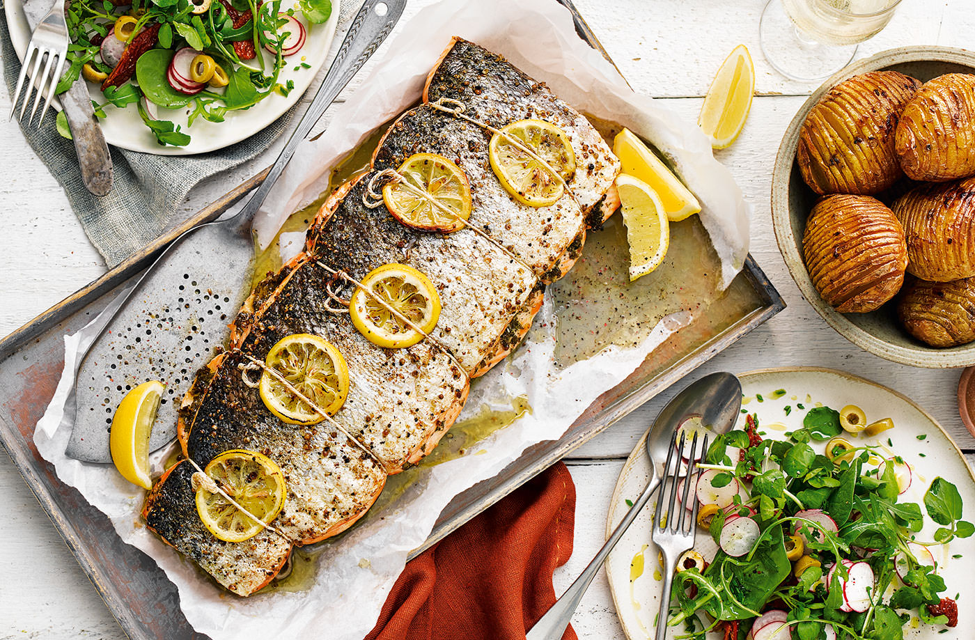 Roast salmon with hasselback potatoes recipe