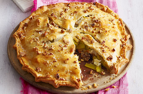 There are only a handful of ingredients in this cheese, leek and walnut pie but the result is something much more than the sum of its parts. Bake the leeks in the oven, then assemble the pie using ready made shortcrust pastry and bake until crisp and golden.
