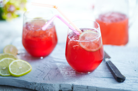 Treat the kids to a summer refresher with this recipe for pink lemonade. Syrup made from fresh raspberries, sugar, water and lemon juice gives this beverage its bright and natural colour while soda water adds a pleasant fizz.