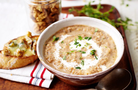 A substantial mushroom and rice soup for winter nights, with softnened garlic, onion and thyme. It is accompanied by slices of warm crusty baguette, oozing with melted Stilton and walnuts, straight from the grill.