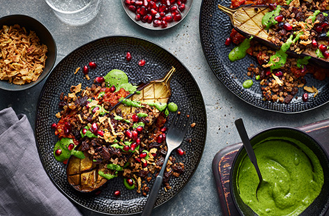 Packed with a warmly spiced vegan mince filling, this stuffed aubergine recipe from Noda Marvani is a hearty family meal that's vegan, gluten-free and dairy-free