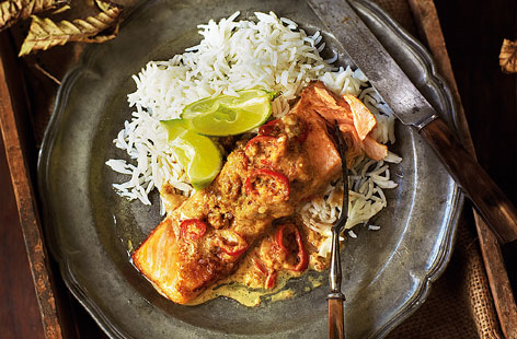 These fragrant salmon, coconut and lime parcels can be baked in the oven or, if you have barbecue embers still smouldering, cooked outdoors. The fish sits in an aromatic coconut, lime, chilli, soy and lemon grass sauce so make sure the foil is tightly sealed around them.