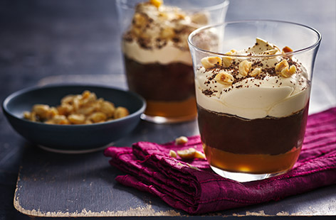 Rich and sumptuous these little pots of chocolatey goodness pair Tesco Finest Salted Caramel Sauce with a thick chocolate ganache and a liqueur-infused whipped cream topping