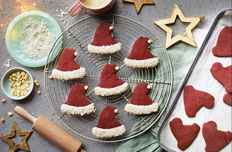 Give Father Christmas a warm welcome this Christmas by leaving out a few of these jolly red velvet Santa hat cookies.
