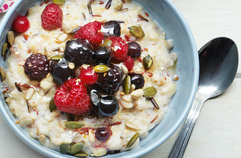 This hearty porridge will warm you up on a cold morning and the tasty seeds and berries give it a delicious crunch.