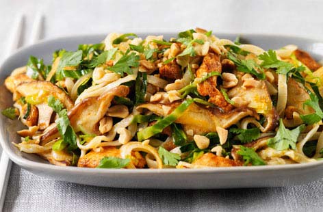 Pad Thai is a classic for a reason: lime juice adds pep, fish sauce brings a touch of sweet and sour, and the peanuts add a gorgeous crunch. The shiitake mushrooms provide a rich, meaty feel, alongside the chicken and greens.
