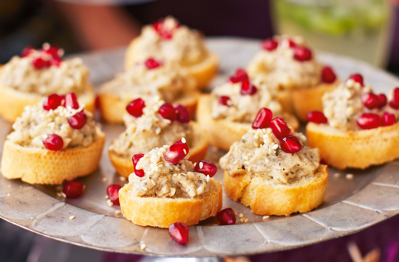 Smoked aubergine caviar crostinis with sesame and pomegranate recipe