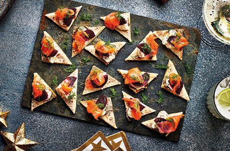 Keep your party guests entertained with some satisfyingly simple canapés, like these no-cook smoked salmon and beetroot bites.
