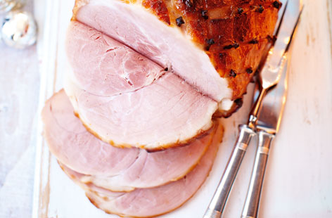 This apricot glazed ham is perfect for feeding the masses during the Christmas period. The ham is first boiled, then roasted, smothered with a warmly spiced apricot jam  glaze. It's delicious warm but also perfect for a brunch of cold cuts the following day.
