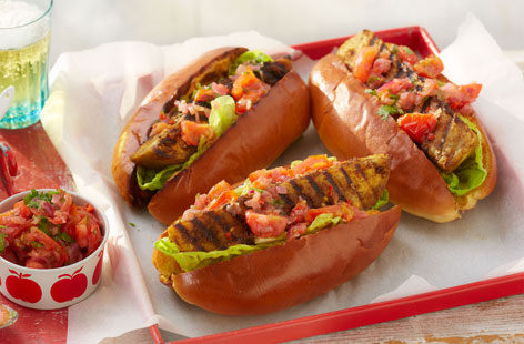 Giving hot dogs a deliciously spicy vegetarian spin; combining with aubergine and hot tomato coriander salsa will give your dogs real bite!
