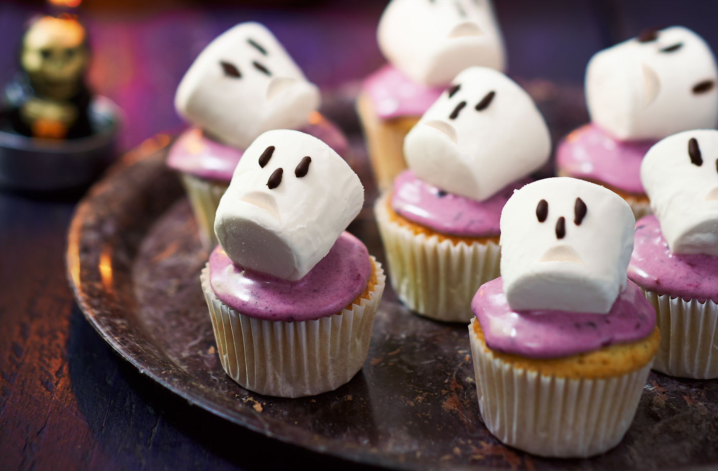 Spooky blackberry cupcakes with marshmallow skulls recipe