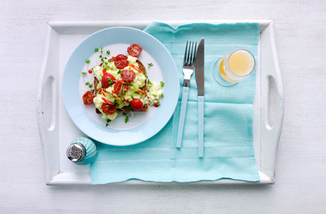 Treat mum to breakfast in bed with this sumptuous scrambled egg recipe. Top with fried tomatoes and a drizzle of Sriracha chilli sauce for a spicy start to the day