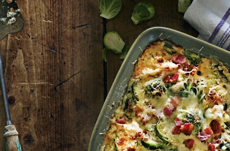 How do you make brussels sprouts the star of the Christmas table? You incorporate them into this decadent sprout gratin with mustard and crispy bacon. A generous amount of gruyère and crème fraîche takes the much-maligned vegetable into va-va-voom territory.