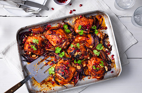 A rich marinade and mouthwateringly sticky glaze gives these tender chicken thighs their wow factor. Scattered with tart pomegranate jewels and fragrant coriander, they are a heavenly meal to rustle up midweek.