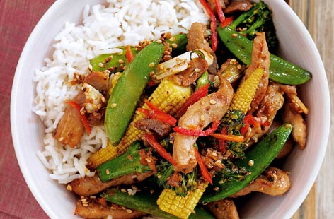 Save the takeaway for another day and try this sticky stir-fried pork with rice or noodles. Sliced into strips, and marinaded in a sweet and tangy mix of honey, ginger, soy and sherry, pork is stir fried with vegetables and served with chilli and sesame seeds.