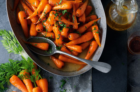 You don't have to do much to Chantenay carrots to make them sing with sweetness. Cook them slowly to release their flavour and drizzle with maple syrup or honey, sprinkle with fresh parsley and serve as a side with your roast.