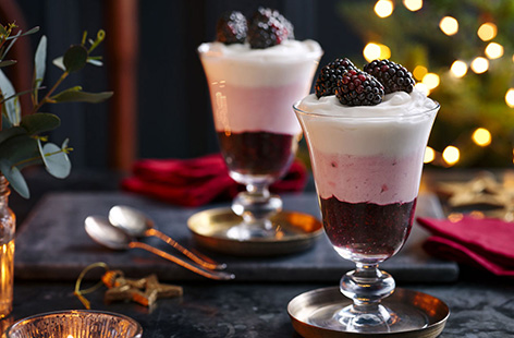 This easy blackberry fool recipe puts a new vegan twist on the classic English dessert. Layer up sweet blackberry pureé with creamy coconut yogurt for a pretty striped dessert, perfect for Christmas.

