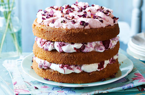 This floral-inspired cake – with pretty pink petals, sweet raspberries and cream – is perfect for a special occassion