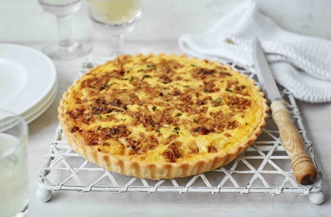 Inspired by classic Welsh rarebit, this gloriously cheesy tart is brimming with flavour thanks to strong Cheddar, mustard, leek and Worcestershire sauce