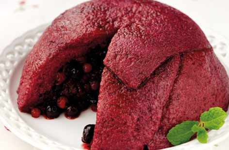 This treat of a summer pudding contains just three ingredients: Frozen berries, honey, and wholemeal bread. The pudding needs a night in the fridge to set so prepare this deliciously refreshing dish the day before.