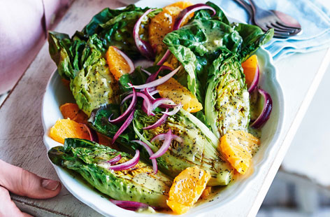 A light, fresh salad of charred baby gem lettuce with juicy orange, crisp red onion and a warming mustard dressing - a great way to add some colour and crunch to your spread