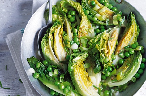 Looking for a different sort of side salad? Try this braised lettuce and peas with butter, spring onion and lemon juice the next time you're planning a roast for the family.