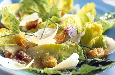 Our classic Caesar salad recipe combines crisp cos lettuce, smoky bacon, Parmesan shavings and crunchy croutons with a honey, mustard and vinegar dressing. Enjoy as a tasty starter, as an on-the-go lunch or make a bigger portion for a filling main meal