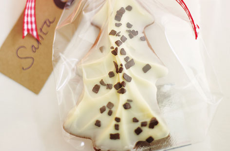 There's nothing like branching out and making edible gifts, and these chocolate Christmas tree biscuits are a crunchy and moreish treat that everyone will enjoy. Get the family involved with the baking and try not to eat all the chocolate before you've decorated them.