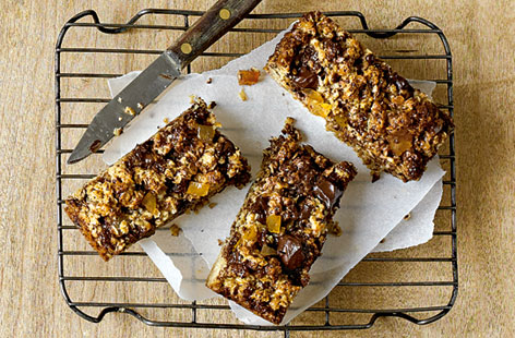 Make a batch of these chocolate and ginger flapjacks for a teatime treat with a difference. You'll need good quality dark chocolate, stem ginger and ground ginger as well as the classic flapjack ingredients: butter, sugar, oats and golden syrup.
