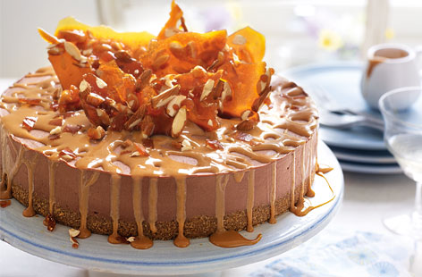 A striking-as-it-is-scrummy chocolate cheesecake recipe, and one to serve at a special dinner party. The filling made with chocolate, soft cheese and mascarpone, sits on a buttery biscuit base, and is dramatically decorated with shards of almond brittle.