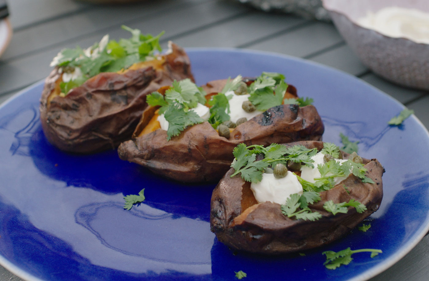 Ember-roasted sweet potatoes with cream cheese and capers recipe
