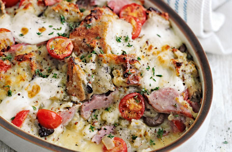 This wonderful recipe uses bread rather than pasta to make a hearty and mouthwatering bake with ham, cheese and tomato.